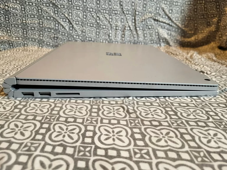 Microsoft Surface Book Laptop 128GB SSD, Intel I5 Processor, 8GB Ram side one ports Microsoft Surface Book Laptop 128GB SSD, Intel I5 Processor, 8GB Ram side one ports