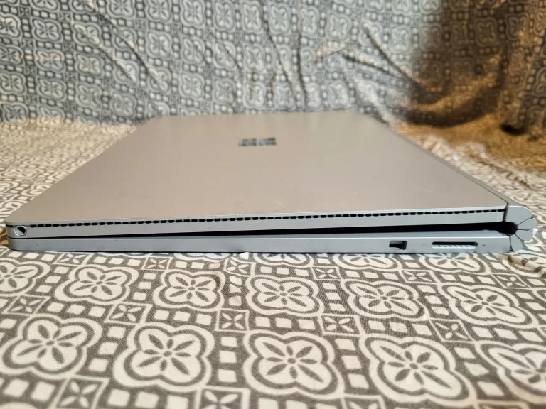 Microsoft Surface Book Laptop 128GB SSD, Intel I5 Processor, 8GB Ram side two ports Microsoft Surface Book Laptop 128GB SSD, Intel I5 Processor, 8GB Ram side two ports