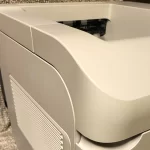 HP LaserJet Enterprise 600 Printer M601 side view two HP LaserJet Enterprise 600 Printer M601 side view two