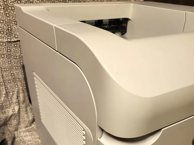 HP LaserJet Enterprise 600 Printer M601 side view two HP LaserJet Enterprise 600 Printer M601 side view two