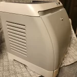 HP Color LaserJet 2600n Printer side view one HP Color LaserJet 2600n Printer side view one