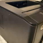 HP LaserJet Pro 400 Printer M401 Series side view two HP LaserJet Pro 400 Printer M401 Series side view two