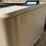 HP LaserJet Pro M402dn Monochrome Laser Printer Side View One HP LaserJet Pro M402dn Monochrome Laser Printer Side View One